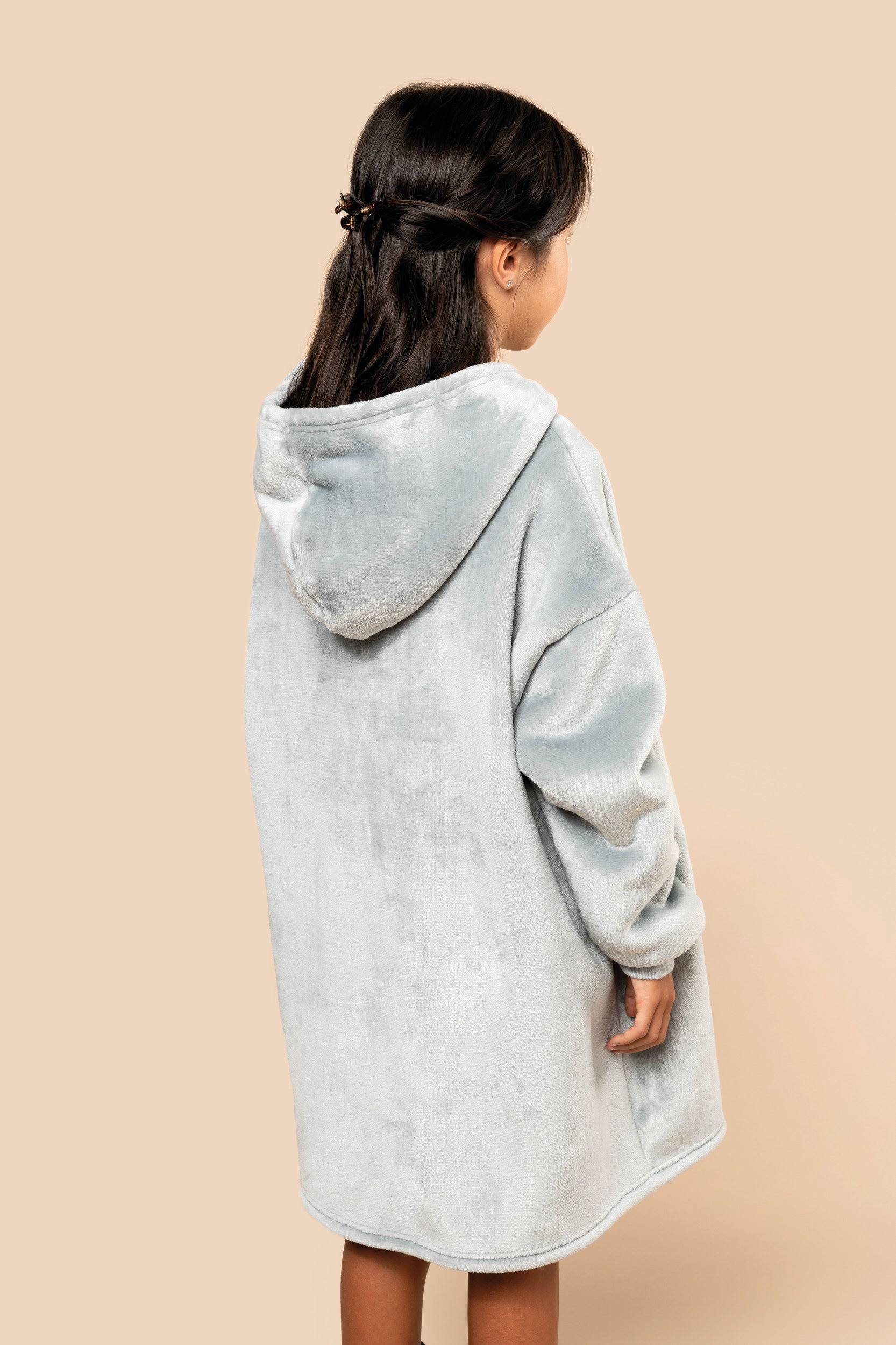 Geborduurde surf poncho of badcape kind gepersonaliseerd met naam tekst of logo Kariban Antwerpen achterzijde 