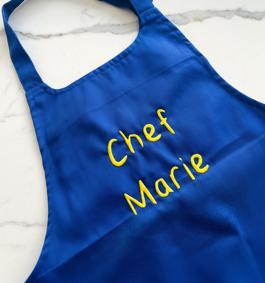 Professioneel geborduurde keukenschort te Antwerpen