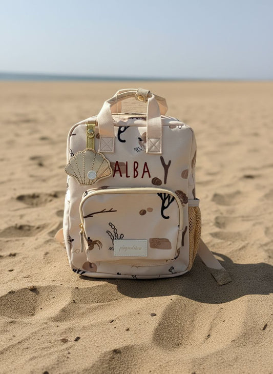 Gepersonaliseerde rugzak met geborduurde naam en schelpen print