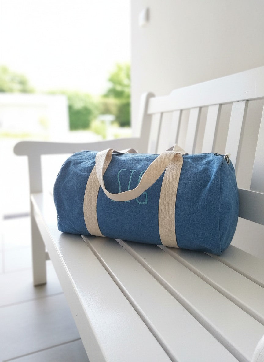 Jeans luiertas geborduurd met gepersonaliseerde naam als kraamcadeau