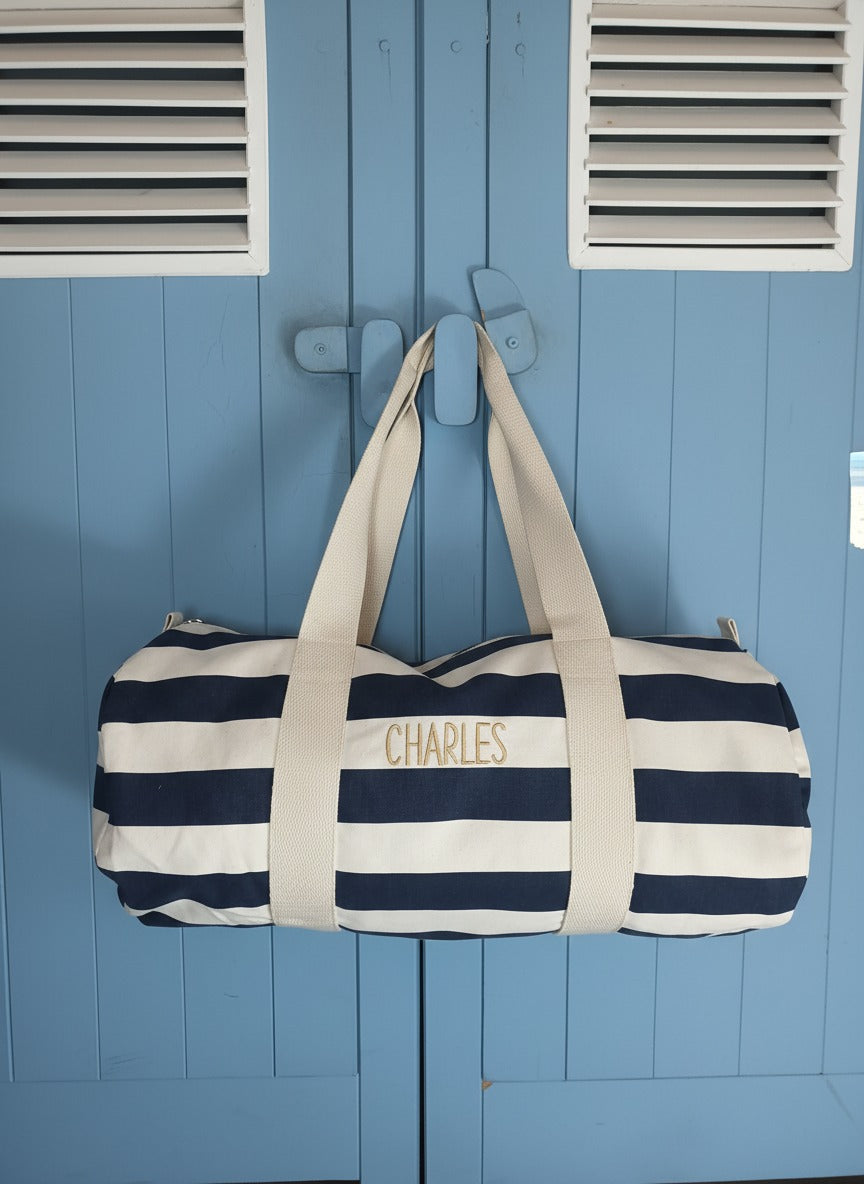 Luiertas met personalisatie van naam geborduurd