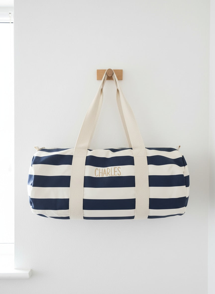 Reistas met blauwe strepen stijlvol geborduurd met unieke naam of tekst