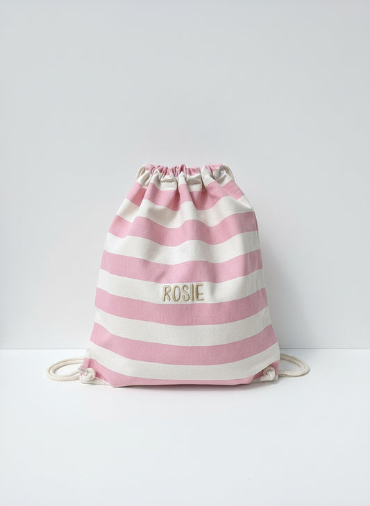 Roze gestreept turnzakje met stijlvol geborduurde naam in gouden letters