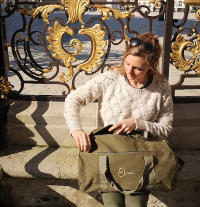 Gepersonaliseerde vintage sportzak of weekender geborduurd met naam tekst of logo te Antwerpen van het merk bagbase